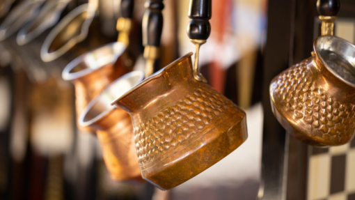 Cezve - Turkish Coffee Pot - hanging at an outdoor market