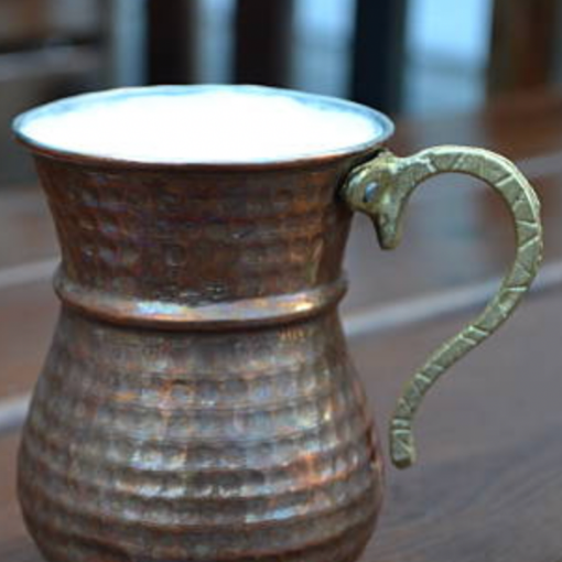 Ayran: Refreshing Drink in Turkey served in a traditional copper mug