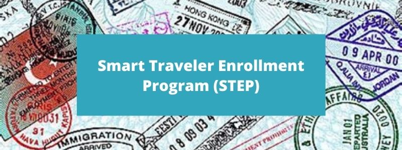 Smart Traveler Enrollment Program on a background of passport stamps