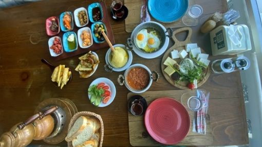 Turkish Breakfast in Trabzon by the water that included kuymak, special pastes unique to the Black sea region and delicious tea