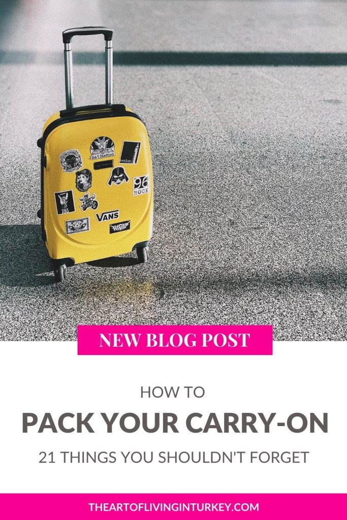 pinterest pin for how to pack your carry-on the 21 things you shouldn't forget