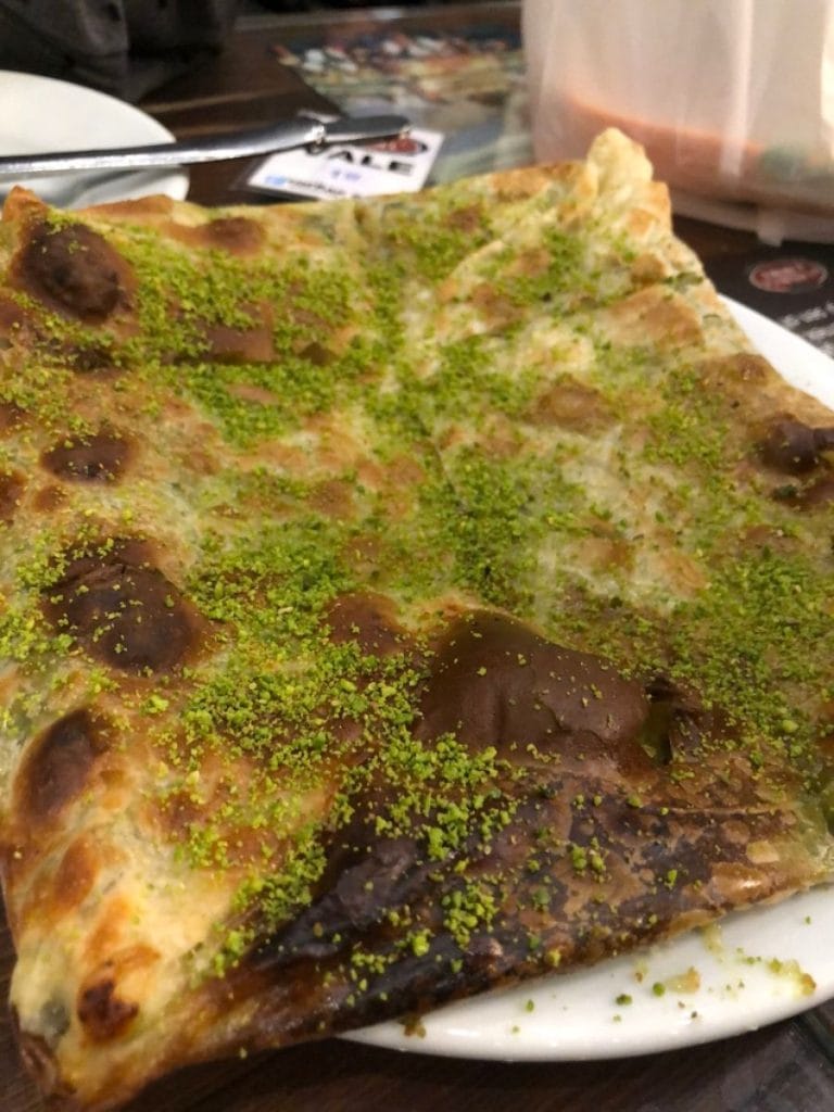 A traditional Katmer dessert with ground pistachios on top
