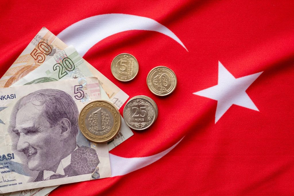 turkish money on turkish flag