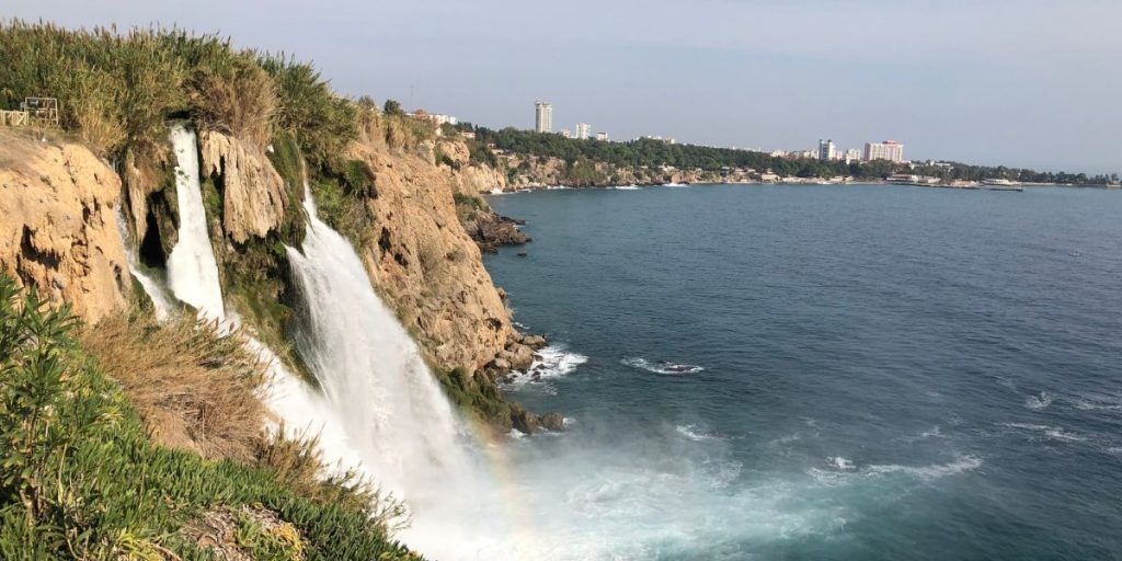 Lower Duden Falls in Antlaya with the water rushing over into the sea