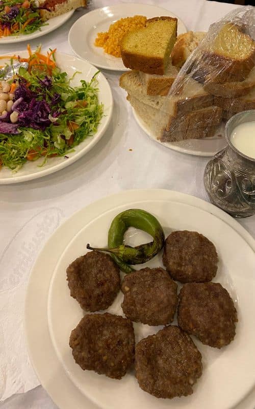 Akçabat köfte with bread, salad and bulgur. 
