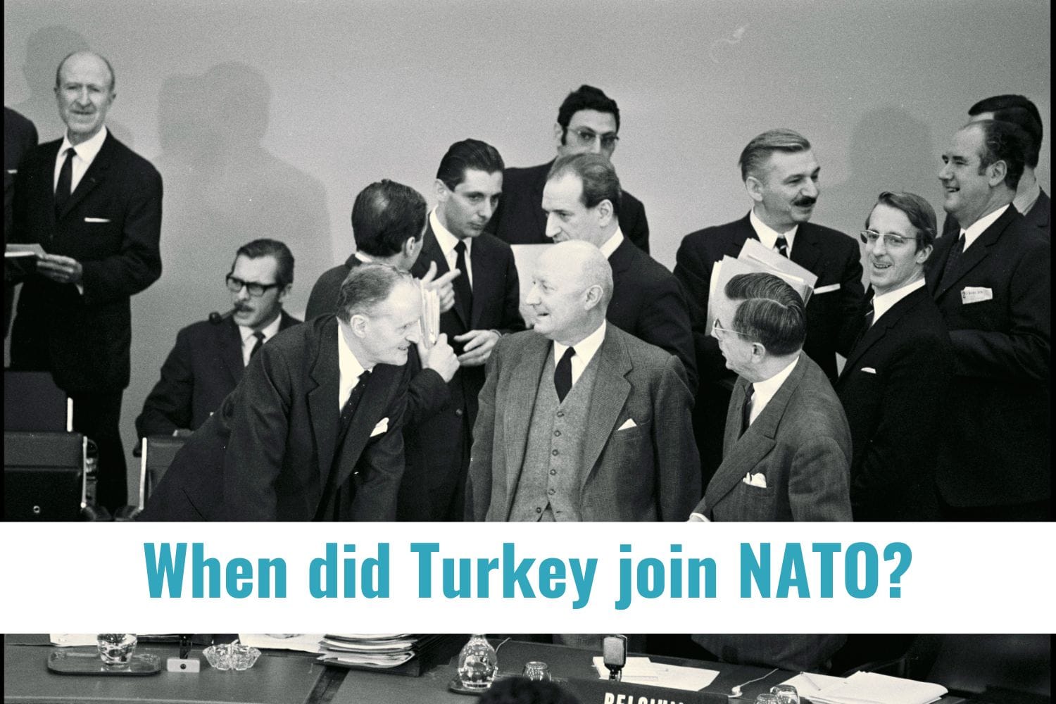Group of men signing Turkey into NATO answering the question of When did Turkey join NATO?