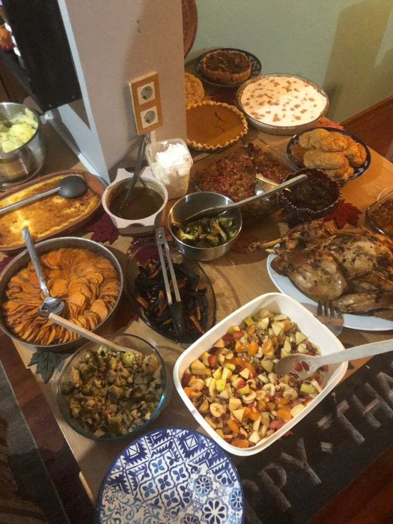 Thanksgiving spread in Turkiye with mashed potatoes, green bean casserole, pies, sweet potatoes and gravy.