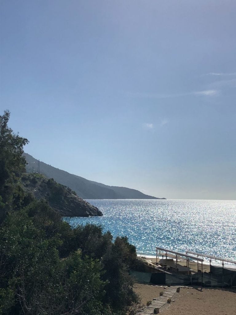 ölüdeniz  beach with the sun bouncing off the mediterranean sea. 