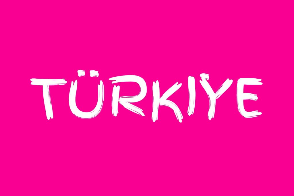 Turkiye on a pink background. Turkiey is Turkey in Turkish.