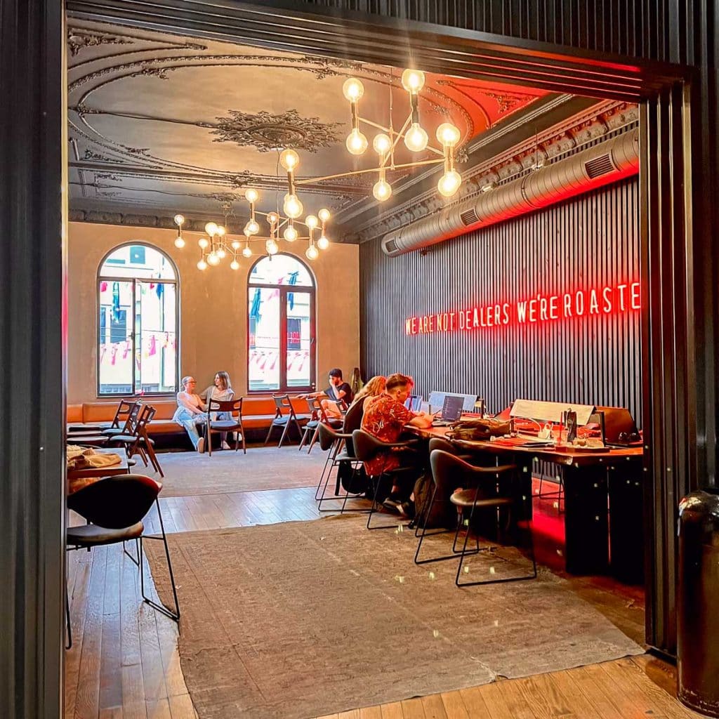 EspressoLab's trendy area and work stations with really tall black ceilings.