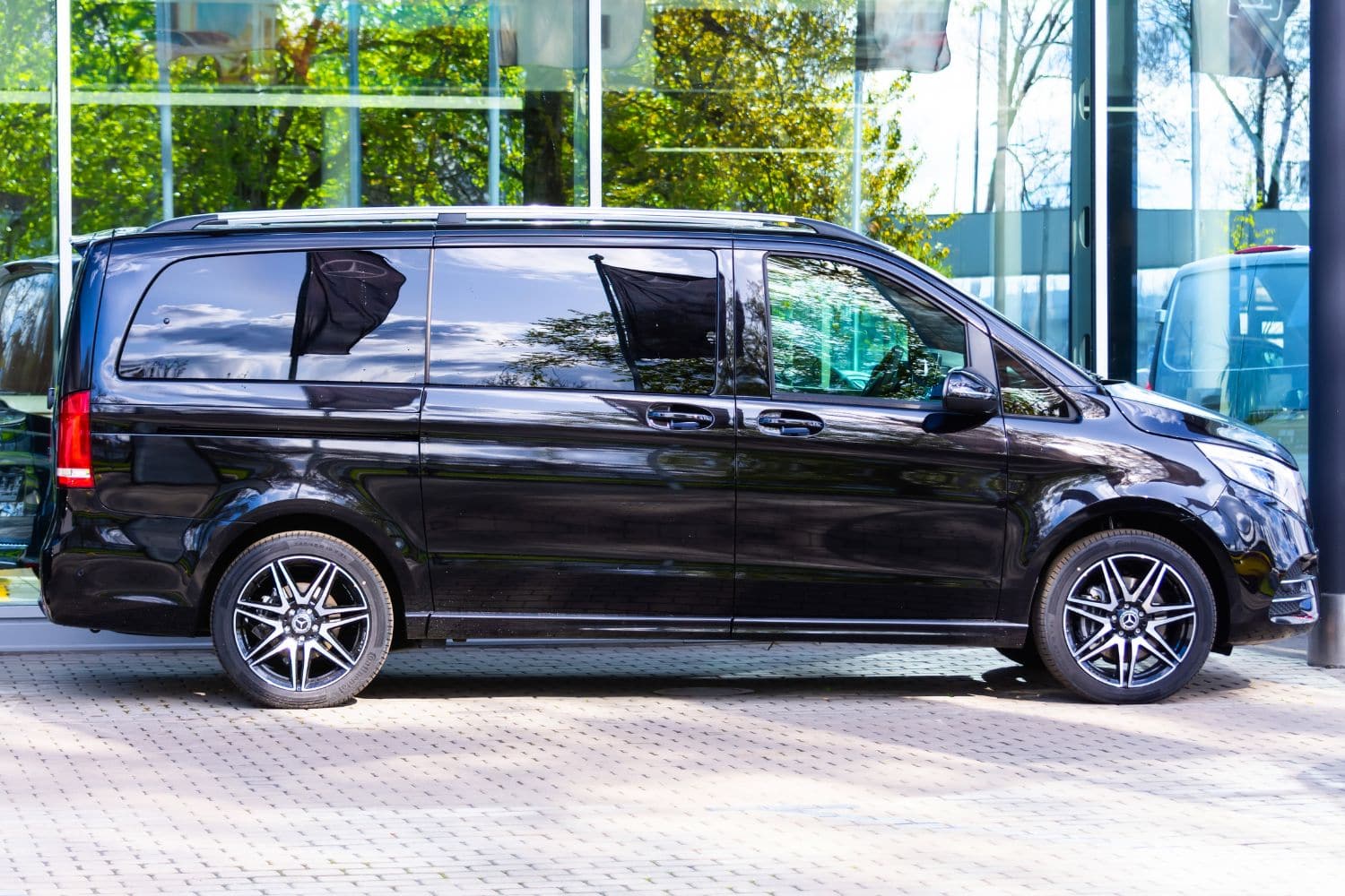 Black van parked that is used for istanbul airport transfers