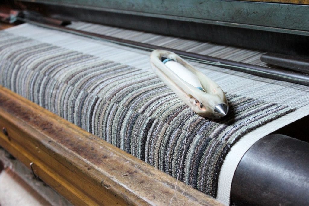 beautiful towel on a loom that is being thick-loop weaved