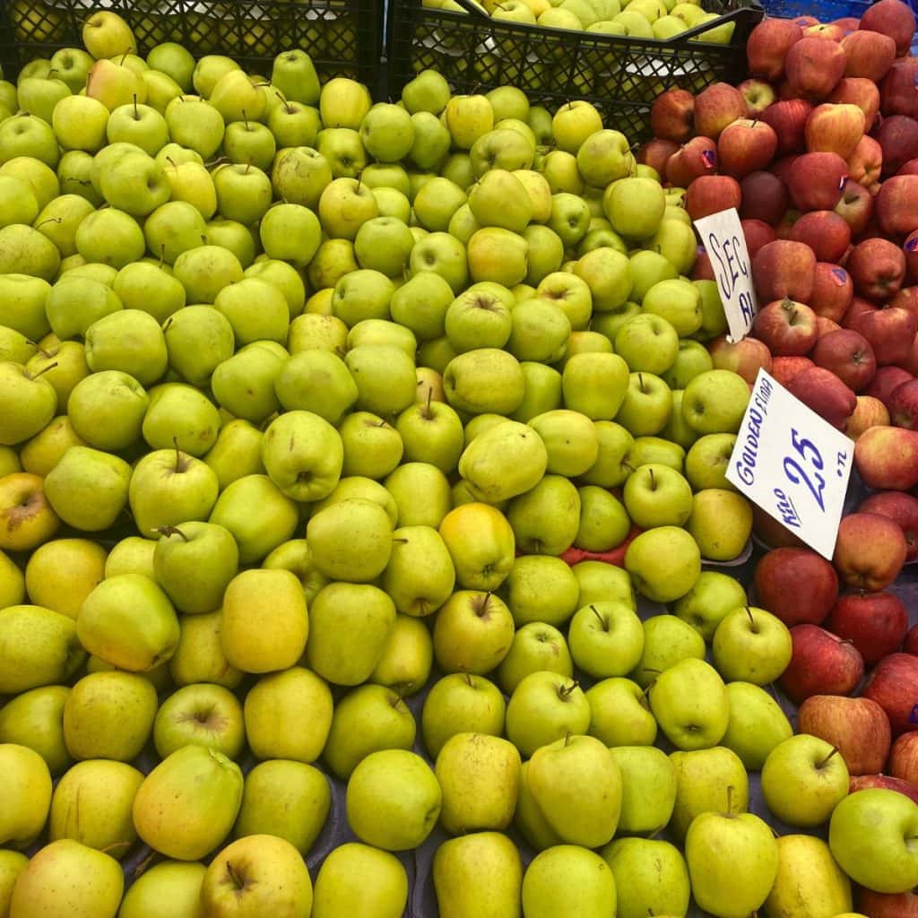 Green apples at a local market in autumn.