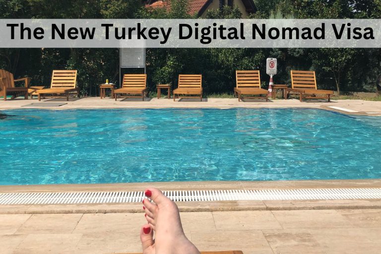 kimberly sitting poolside with her feet facing a lovely pool in sapanca with the post's title on the cover - the new turkey digital nomad visa.