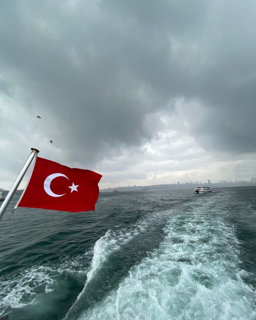 Ferryride with the Turkish flag flowing behind