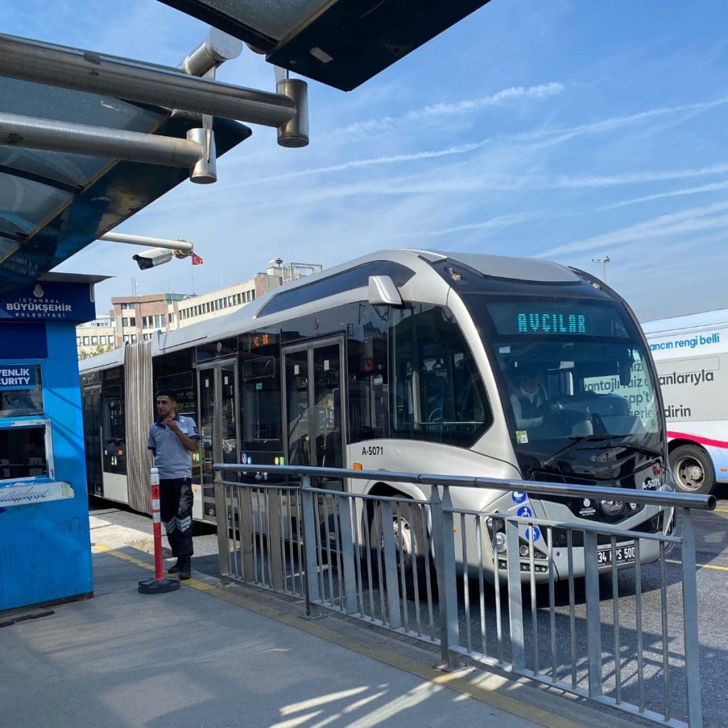 The black and grey metrobus transports people across Istanbul.