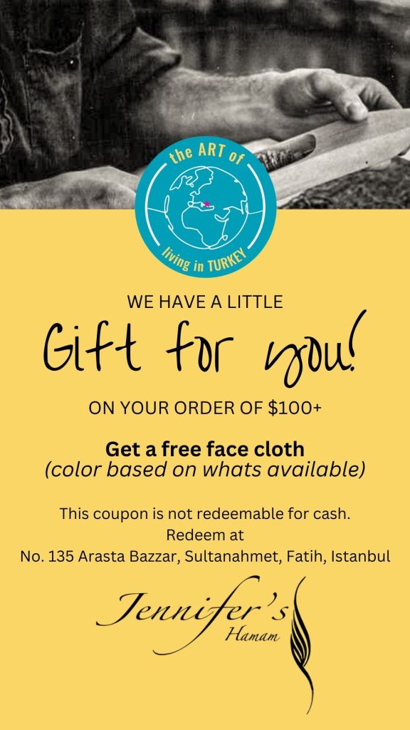 a coupon for a free face cloth with $100 purchase at Jennifer's Hamam