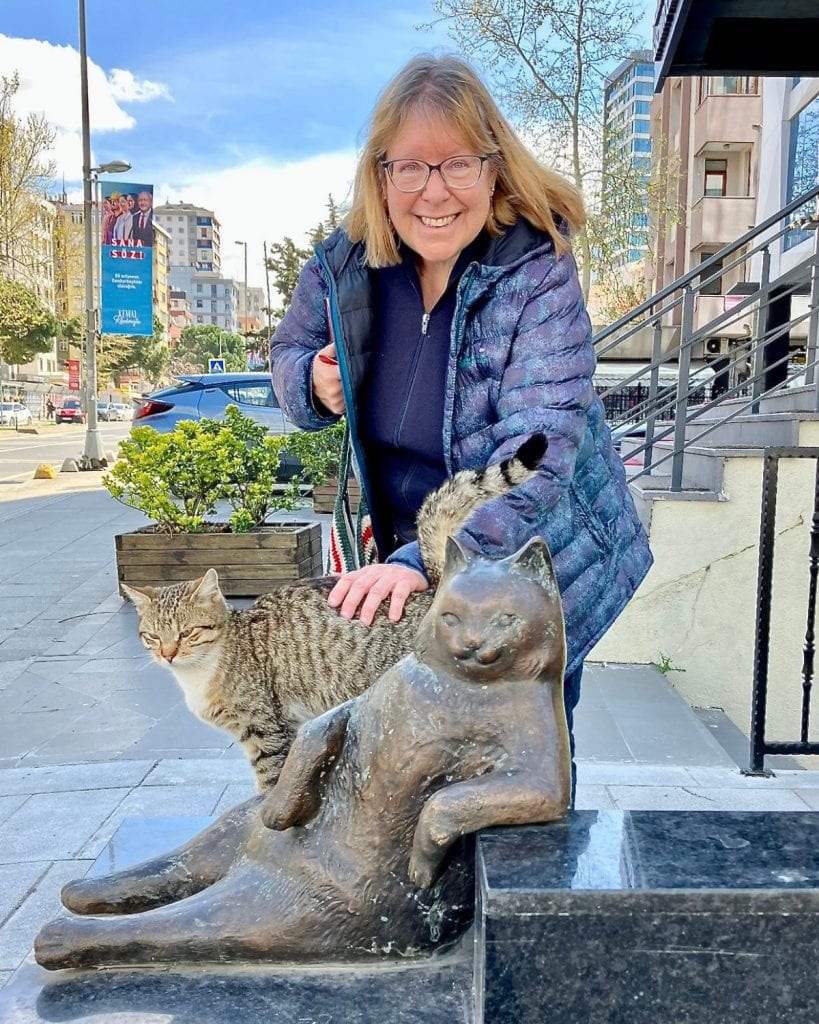 Pat Yale in front of a statue of a cat in Kadikoy