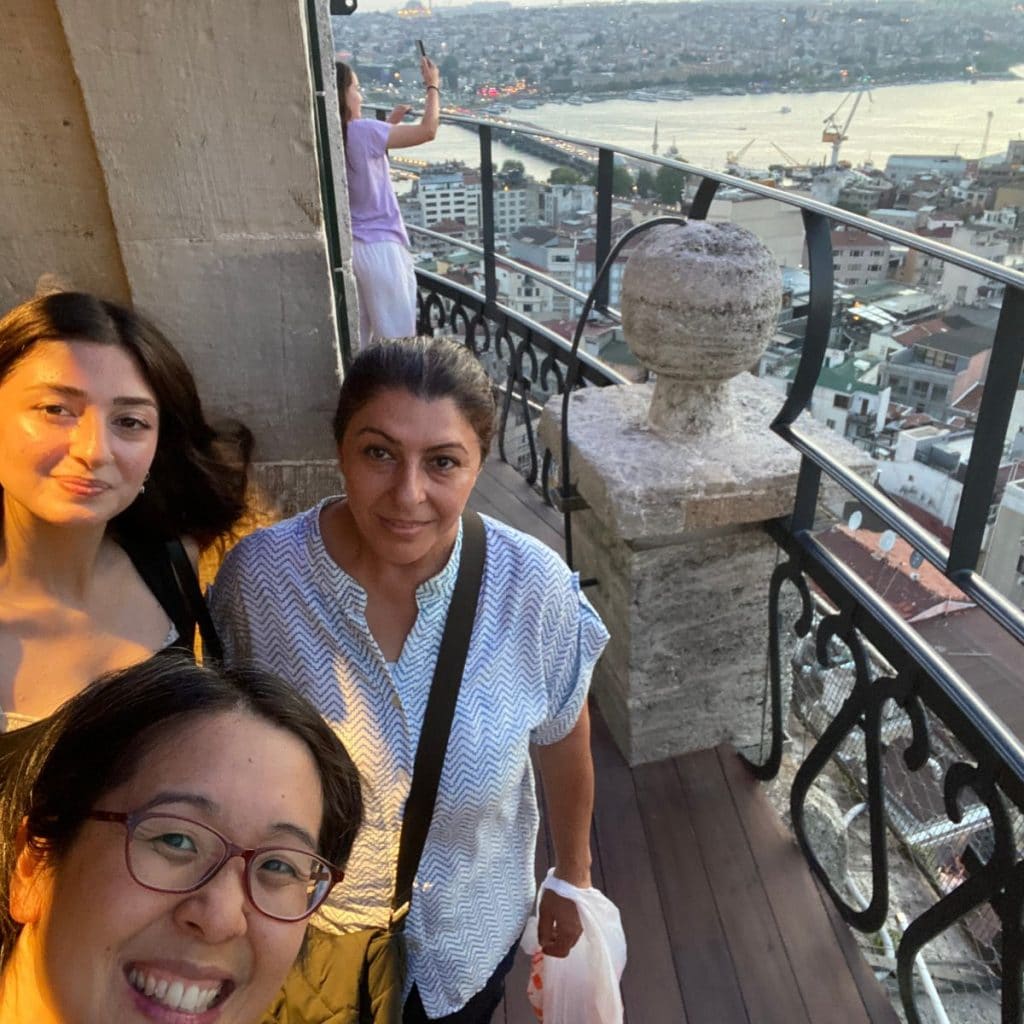 Three women enjoy the view from the top of the Galata Tower