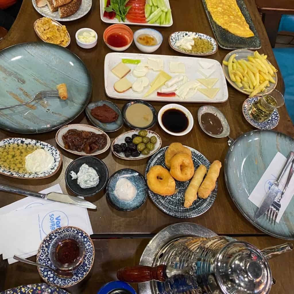 A table covered with small dishes for Turkish breakfast in the style of the Van region.